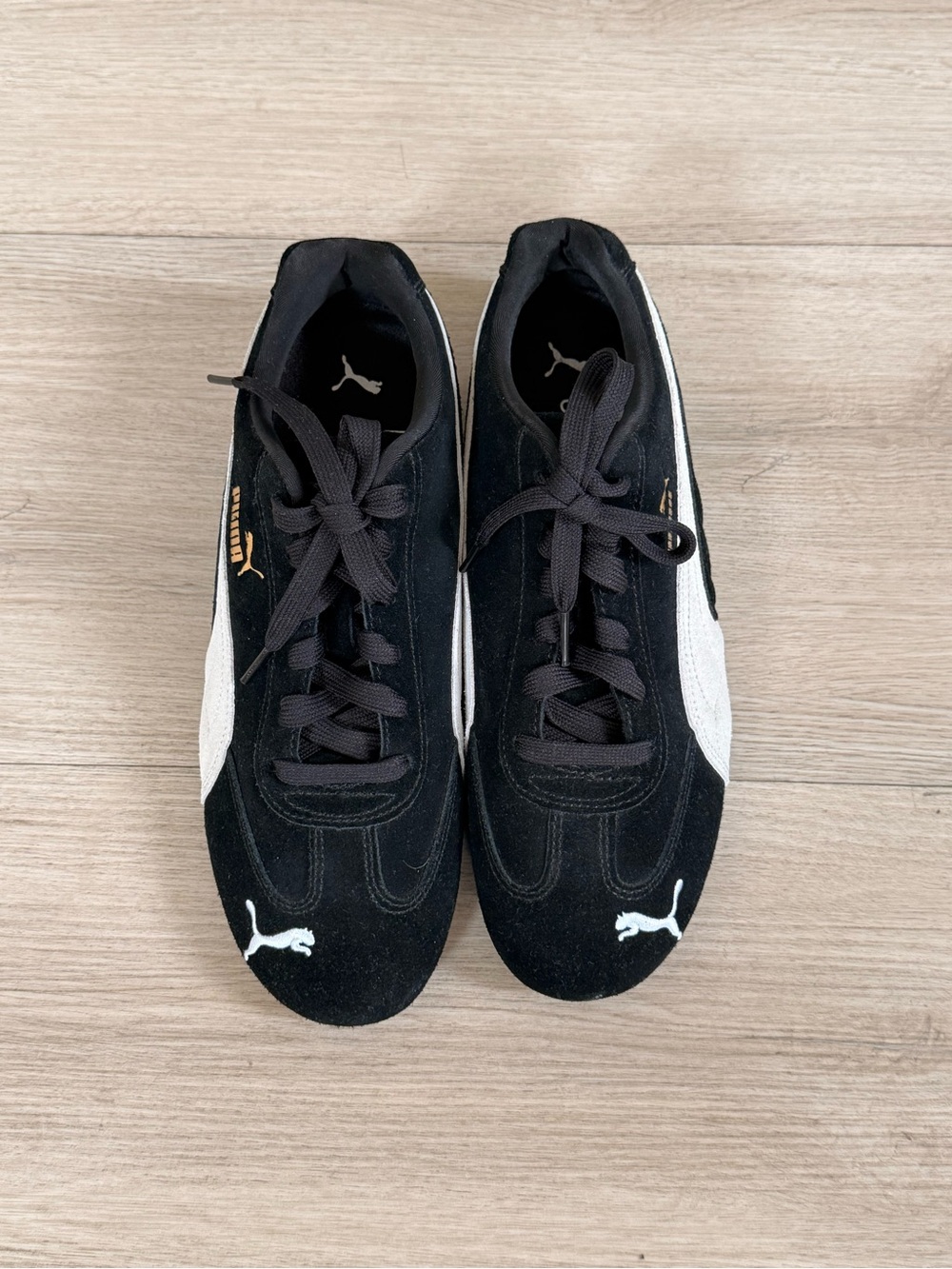 Puma Black Suede Sneakers with White Formstrip and Gold Accents (unisex)
